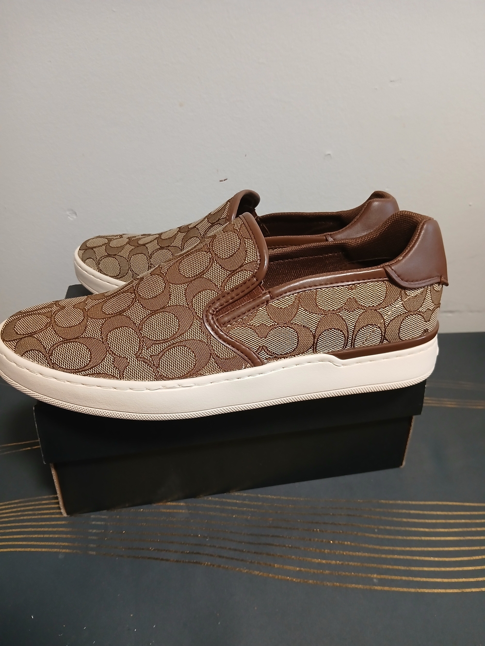 Coach Brown/Tan Signature Slip-On Sneakers $75